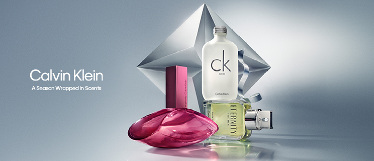 Modell och Calvin Klein Euphoria Elixir parfymflaskor