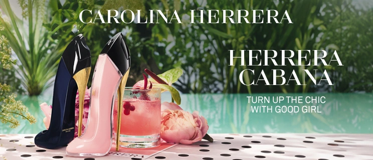 I profumi di Carolina Herrera in estate a bordo piscina con un cocktail
