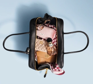 Handtasche mit miu miu Parfum Flakon