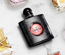 Flakony parfémů YSL a parfém Black Opium